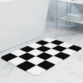 THMINS Black and White Checkered Stone Bath Mat by THMINS